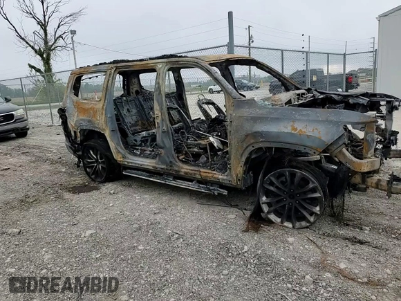 2022 Jeep Wagoneer Series II z VIN 1C4SJVBT0NS165195, wystawiony jako Copart lot #56209585 z przebiegiem Nie podano mil oraz Nie do naprawy • Non repairable. Historia ofert i sprzedaży dostępna na DreamBid. Obrazek 13.