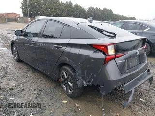2019 Toyota Prius L Eco z VIN JTDKARFU8K3085918, wystawiony jako IAAI lot #41107891 z przebiegiem 166 295 mil mil oraz . Historia ofert i sprzedaży dostępna na DreamBid. Obrazek 3.