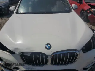 2017 BMW X1 xDrive28i z VIN WBXHT3C35H5F86099, wystawiony jako Copart lot #60196275 z przebiegiem 61 117 mil mil oraz Szkoda całkowita • Salvage title. Historia ofert i sprzedaży dostępna na DreamBid. Obrazek 11.