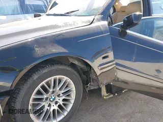 2003 BMW 5 Series 530iA with VIN WBADT63493CK37063, listed as a IAAI auction lot 41637589 with 179,191 mi miles. Bid and sale history available at carsss.com. Image 6.