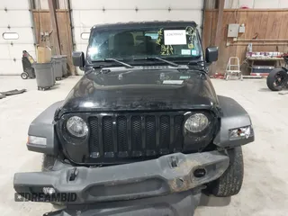 2019 Jeep Wrangler Unlimited Sport Altitude with VIN 1C4HJXDGXKW505396, listed as a IAAI auction lot 42039985 with 146,178 mi miles and . Bid and sale history available at DreamBid. Image 12.