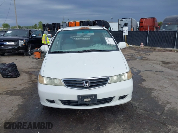 2004 Honda Odyssey EX-L with VIN 5FNRL18074B109717, listed as a IAAI auction lot 37731273 with 314,449 mi miles and . Bid and sale history available at DreamBid. Image 12.