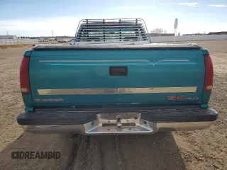 1994 GMC Sierra 1500 with VIN 1GTEK14K5RE539652, listed as a Copart auction lot 80877094 with 162,533 mi miles and Salvage Title. Bid and sale history available at DreamBid. Image 6.