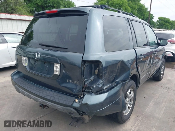 2005 Honda Pilot EX-L with VIN 5FNYF18565B046464, listed as a IAAI auction lot 41879495 with 228,021 mi miles. Bid and sale history available at carsss.com. Image 4.