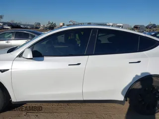2023 Tesla Model Y Long Range with VIN 7SAYGDEE1PA128818, listed as a IAAI auction lot 41622062 with 19,089 mi miles. Bid and sale history available at carsss.com. Image 15.