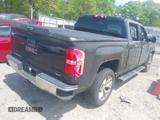 2015 GMC Sierra 1500 SLT with VIN 3GTU2VEC5FG200727, listed as a IAAI auction lot 42017160 with 191,201 mi miles and . Bid and sale history available at DreamBid. Image 4.