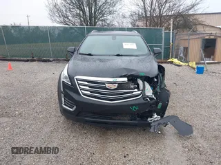 2018 Cadillac XT5 FWD with VIN 1GYKNARS6JZ160993, listed as a IAAI auction lot 41472847 with 113,415 mi miles. Bid and sale history available at carsss.com. Image 12.
