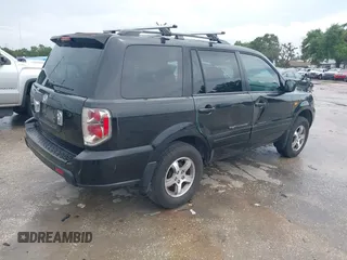2007 Honda Pilot EX-L with VIN 5FNYF28577B028130, listed as a IAAI auction lot 42434714 with 179,299 mi miles and . Bid and sale history available at DreamBid. Image 4.
