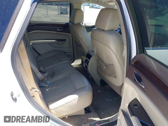 2016 Cadillac SRX Luxury Collection z VIN 3GYFNEE34GS513728, wystawiony jako IAAI lot #41847871 z przebiegiem 109 045 mil mil oraz . Historia ofert i sprzedaży dostępna na DreamBid. Obrazek 8.