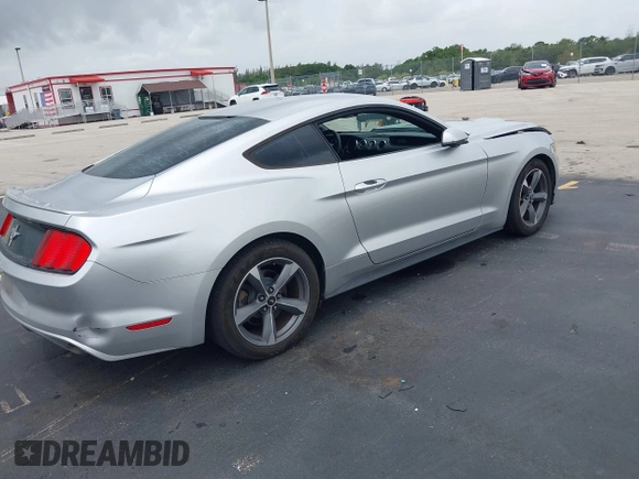 2015 Ford Mustang V6 z VIN 1FA6P8AM1F5316868, wystawiony jako IAAI lot #42618687 z przebiegiem 93 238 mil mil oraz . Historia ofert i sprzedaży dostępna na DreamBid. Obrazek 4.