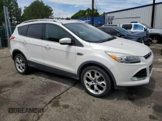 2013 Ford Escape Titanium с VIN 1FMCU9J95DUC35233, выставлен на аукционе Copart как лот 66898135 с пробегом 170 214 миль миль и Чистый • Clean title. История ставок и продаж доступна на DreamBid. Изображение 4.