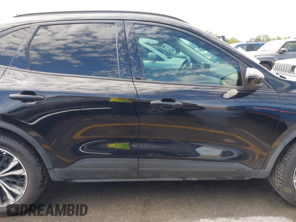 2021 Ford Escape SE with VIN 1FMCU0G62MUA12575, listed as a IAAI auction lot 42293939 with 96,359 mi miles and . Bid and sale history available at DreamBid. Image 14.