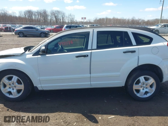 2007 Dodge Caliber SXT with VIN 1B3HB48B67D238157, listed as a IAAI auction lot 41935586 with 115,127 mi miles and . Bid and sale history available at DreamBid. Image 14.