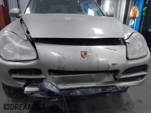 2006 Porsche Cayenne S z VIN WP1AB29P16LA66833, wystawiony jako IAAI lot #41727403 z przebiegiem 149 596 mil mil oraz . Historia ofert i sprzedaży dostępna na DreamBid. Obrazek 6.