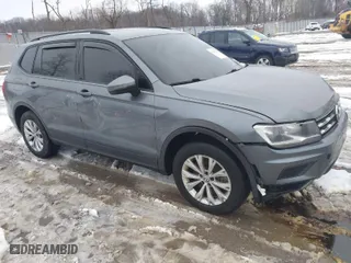 2018 Volkswagen Tiguan S with VIN 3VV0B7AX1JM143571, listed as a IAAI auction lot 41555436 with 72,545 mi miles. Bid and sale history available at carsss.com. Image 1.
