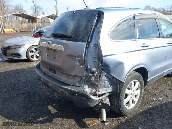 2007 Honda CR-V EX-L with VIN JHLRE38727C050423, listed as a IAAI auction lot 41808938 with 155,851 mi miles. Bid and sale history available at carsss.com. Image 6.