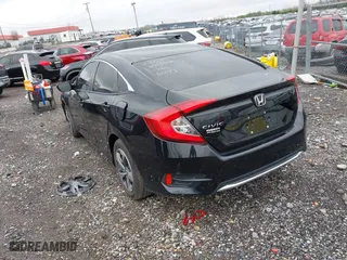 2019 Honda Civic Sedan LX with VIN 2HGFC2F63KH506477, listed as a IAAI auction lot 41934962 with 40,997 mi miles. Bid and sale history available at carsss.com. Image 3.