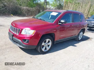 2011 Jeep Compass Latitude with VIN 1J4NF1FB3BD188487, listed as a IAAI auction lot 42250377 with 107,795 mi miles and . Bid and sale history available at DreamBid. Image 2.