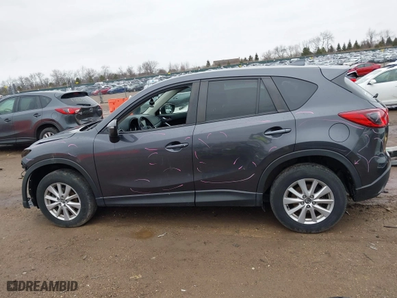 2016 Mazda CX-5 Touring with VIN JM3KE4CY7G0715507, listed as a IAAI auction lot 41699610 with 108,206 mi miles. Bid and sale history available at carsss.com. Image 15.