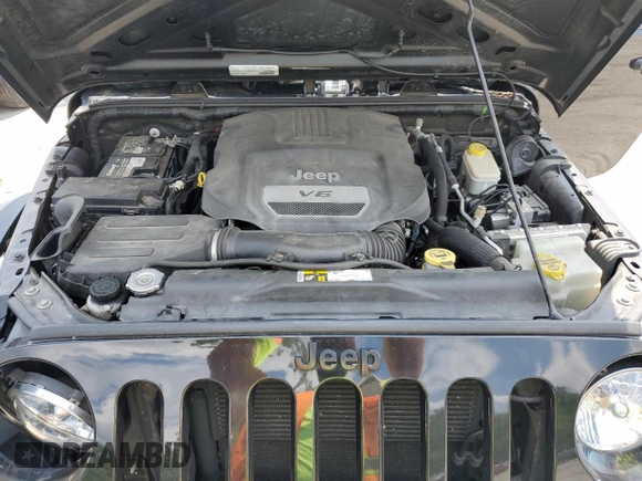 2015 Jeep Wrangler Freedom Edition with VIN 1C4AJWAG8FL688255, listed as a Copart auction lot 59722165 with 130,666 mi miles and Salvage title. Bid and sale history available at DreamBid. Image 12.