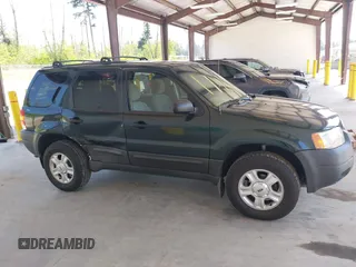 2003 Ford Escape XLT Popular 2 with VIN 1FMCU931X3KC16646, listed as a IAAI auction lot 42160863 with 130,603 mi miles and . Bid and sale history available at DreamBid. Image 13.