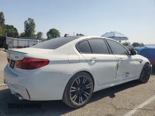 2019 BMW M5 z VIN WBSJF0C53KB284878, wystawiony jako Copart lot #59773965 z przebiegiem Nie podano mil oraz Szkoda całkowita • Salvage title. Historia ofert i sprzedaży dostępna na DreamBid. Obrazek 3.