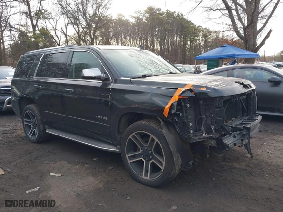 2016 Chevrolet Tahoe LTZ with VIN 1GNSKCKC1GR297871, listed as a IAAI auction lot 41442380 with 91,354 mi miles. Bid and sale history available at carsss.com. Image 13.