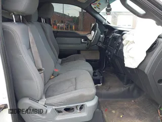 2014 Ford F-150 XL with VIN 1FTMF1CM7EFC60291, listed as a IAAI auction lot 42503556 with 215,474 mi miles and . Bid and sale history available at DreamBid. Image 5.
