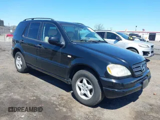 2001 Mercedes-Benz M-Class with VIN 4JGAB54E41A232917, listed as a IAAI auction lot 42055379 with 187,008 mi miles. Bid and sale history available at carsss.com. Image 1.