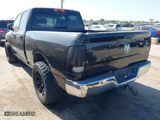 2009 Dodge Ram 1500 SLT with VIN 1D3HB18T19S764885, listed as a IAAI auction lot 41981930 with 157,536 mi miles. Bid and sale history available at carsss.com. Image 3.