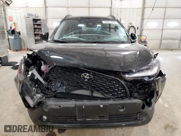 2025 Toyota Corolla Cross XLE с VIN 7MUDAABG0SV129473, выставлен на аукционе Copart как лот 52021975 с пробегом 9 748 миль миль и Списание • Salvage title. История ставок и продаж доступна на DreamBid. Изображение 5.
