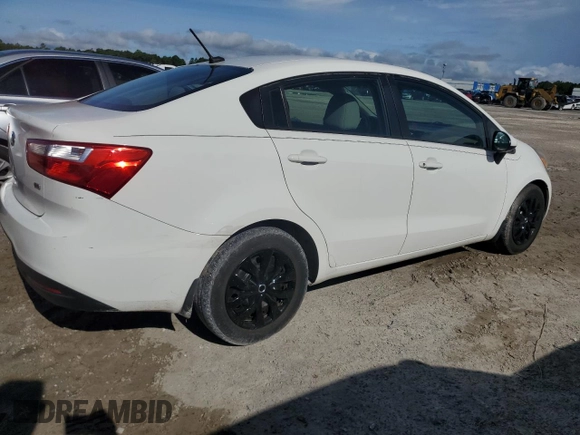 2015 Kia Rio LX with VIN KNADM4A38F6436457, listed as a Copart auction lot 68740994 with 87,474 mi miles and Salvage Title. Bid and sale history available at carsss.com. Image 3.