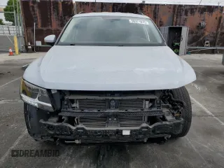 2018 Volkswagen Tiguan S with VIN 3VV1B7AXXJM013468, listed as a Copart auction lot 58371875 with 61,464 mi miles and Salvage title. Bid and sale history available at DreamBid. Image 5.