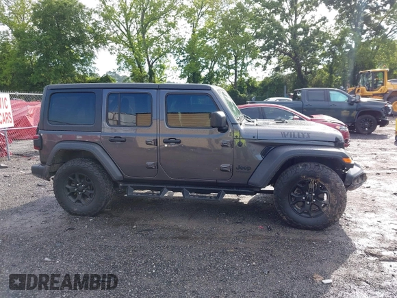 2021 Jeep Wrangler Unlimited Willys с VIN 1C4HJXDG2MW646904, выставлен на аукционе IAAI как лот 42267506 с пробегом 55 530 миль миль и . История ставок и продаж доступна на DreamBid. Изображение 14.