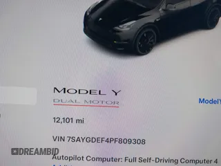 2023 Tesla Model Y Performance with VIN 7SAYGDEF4PF809308, listed as a IAAI auction lot 42056769 with 12,101 mi miles and . Bid and sale history available at DreamBid. Image 6.