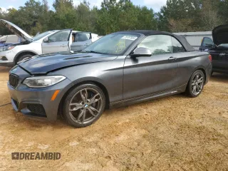2016 BMW 2 Series M235i with VIN WBA1M1C57GV394290, listed as a Copart auction lot 76187684 with 60,838 mi miles and Salvage Title. Bid and sale history available at carsss.com. Image 1.