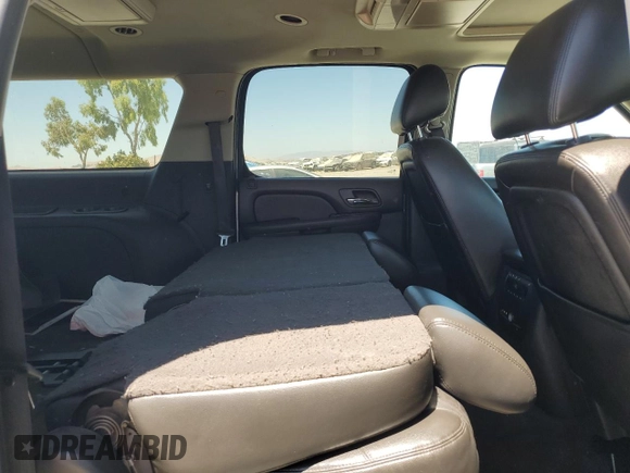 2013 Chevrolet Suburban LT with VIN 1GNSCJE09DR105725, listed as a Copart auction lot 61450935 with 171,659 mi miles and Salvage title. Bid and sale history available at DreamBid. Image 11.