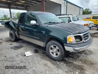 2001 Ford F-150 XL with VIN 1FTRX17L51NA83857, listed as a Copart auction lot 62759145 with 215,961 mi miles and Salvage title. Bid and sale history available at DreamBid. Image 4.