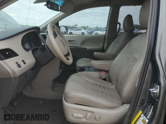 2014 Toyota Sienna LE AAS with VIN 5TDKK3DC5ES440437, listed as a Copart auction lot 52779895 with Not Provided miles and Salvage Title. Bid and sale history available at DreamBid. Image 7.