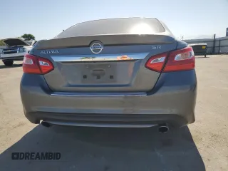 2016 Nissan Altima SR z VIN 1N4AL3AP5GC209029, wystawiony jako Copart lot #55973955 z przebiegiem 131 909 mil mil oraz Szkoda całkowita • Salvage title. Historia ofert i sprzedaży dostępna na DreamBid. Obrazek 6.
