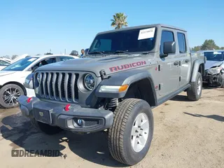2020 Jeep Gladiator Rubicon with VIN 1C6JJTBG6LL149469, listed as a IAAI auction lot 42224826 with 58,870 mi miles and . Bid and sale history available at DreamBid. Image 18.
