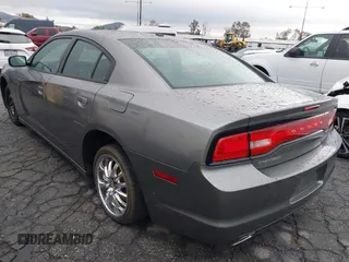 2012 Dodge Charger SXT with VIN 2C3CDXHG1CH278891, listed as a IAAI auction lot 38667338 with 114,099 mi miles. Bid and sale history available at carsss.com. Image 3.