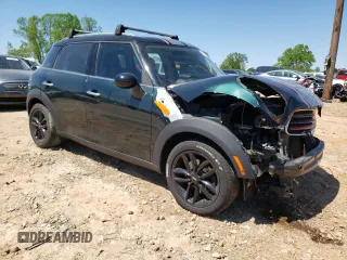 2011 MINI Countryman with VIN WMWZB3C53BWH95264, listed as a Copart auction lot 52238255 with 130,031 mi miles and Salvage Title. Bid and sale history available at DreamBid. Image 4.