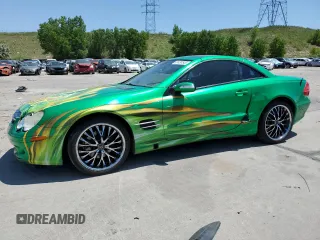 2006 Mercedes-Benz SL 500 with VIN WDBSK75F06F109541, listed as a Copart auction lot 61430545 with 106,428 mi miles and Salvage title. Bid and sale history available at DreamBid. Image 1.