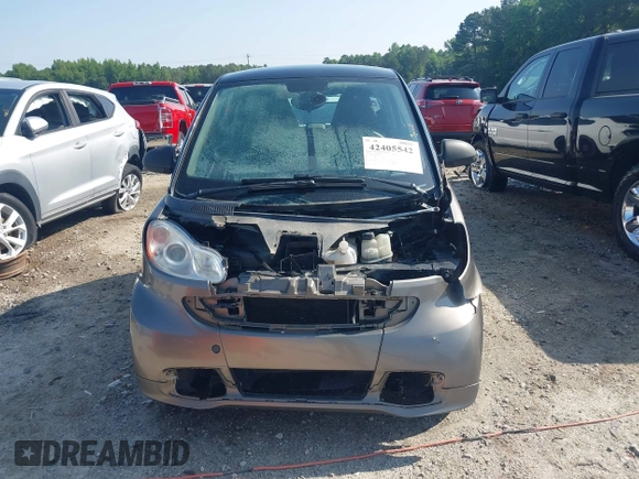2013 Smart fortwo Pure z VIN WMEEJ3BA2DK697614, wystawiony jako IAAI lot #42405542 z przebiegiem 192 027 mil mil oraz . Historia ofert i sprzedaży dostępna na DreamBid. Obrazek 13.