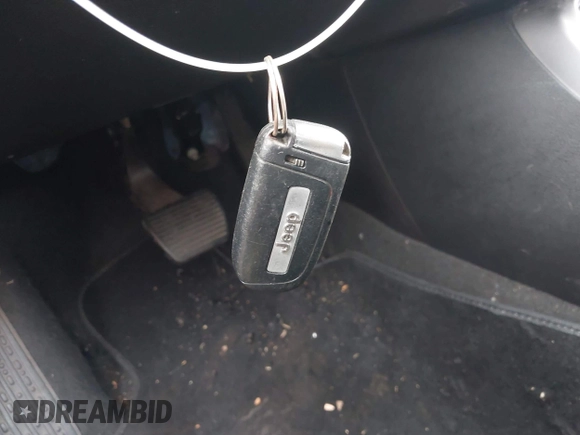 2020 Jeep Compass Latitude with VIN 3C4NJCBB8LT206001, listed as a IAAI auction lot 42352933 with 58,406 mi miles and . Bid and sale history available at DreamBid. Image 11.