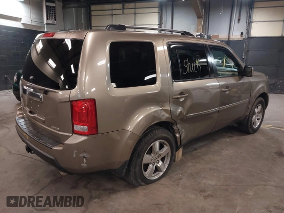 2009 Honda Pilot EX-L with VIN 5FNYF48639B011686, listed as a IAAI auction lot 41958353 with 155,382 mi miles and . Bid and sale history available at carsss.com. Image 4.