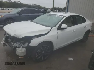 2017 Volvo S60 Dynamic with VIN YV126MFL7H2422860, listed as a Copart auction lot 88963815 with 124,447 mi miles and Salvage Title. Bid and sale history available at carsss.com. Image 1.