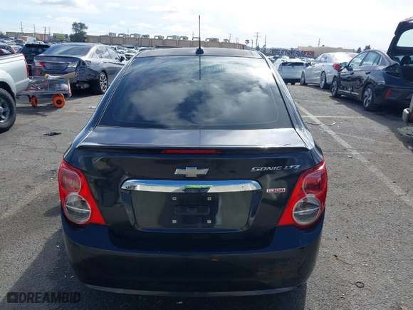 2015 Chevrolet Sonic LTZ with VIN 1G1JE5SB7F4103556, listed as a IAAI auction lot 41527541 with NaN miles. Bid and sale history available at carsss.com. Image 17.