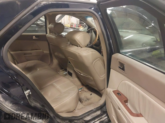 2005 Cadillac STS with VIN 1G6DC67AX50201697, listed as a IAAI auction lot 41822466 with 122,089 mi miles. Bid and sale history available at carsss.com. Image 8.